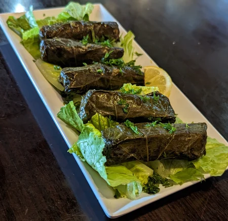 Plate of five grapeleaves.